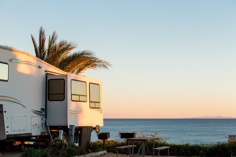 RV parked by the ocean in California.
