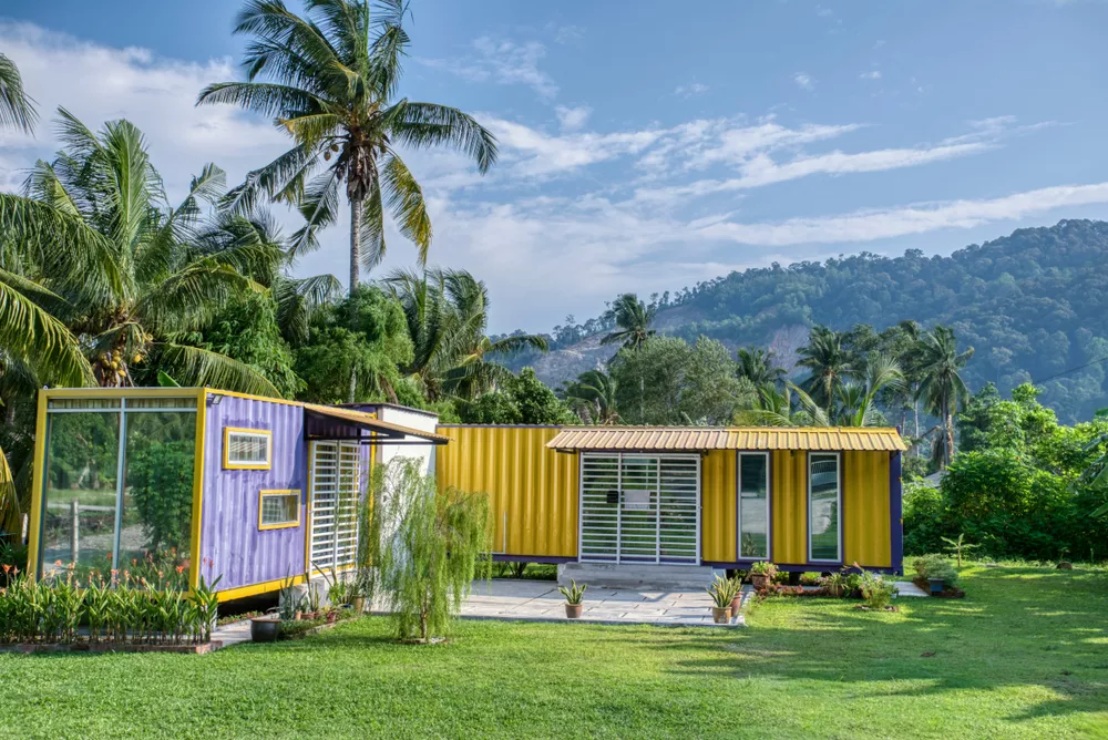 Modern and colorful shipping container home in the tropics