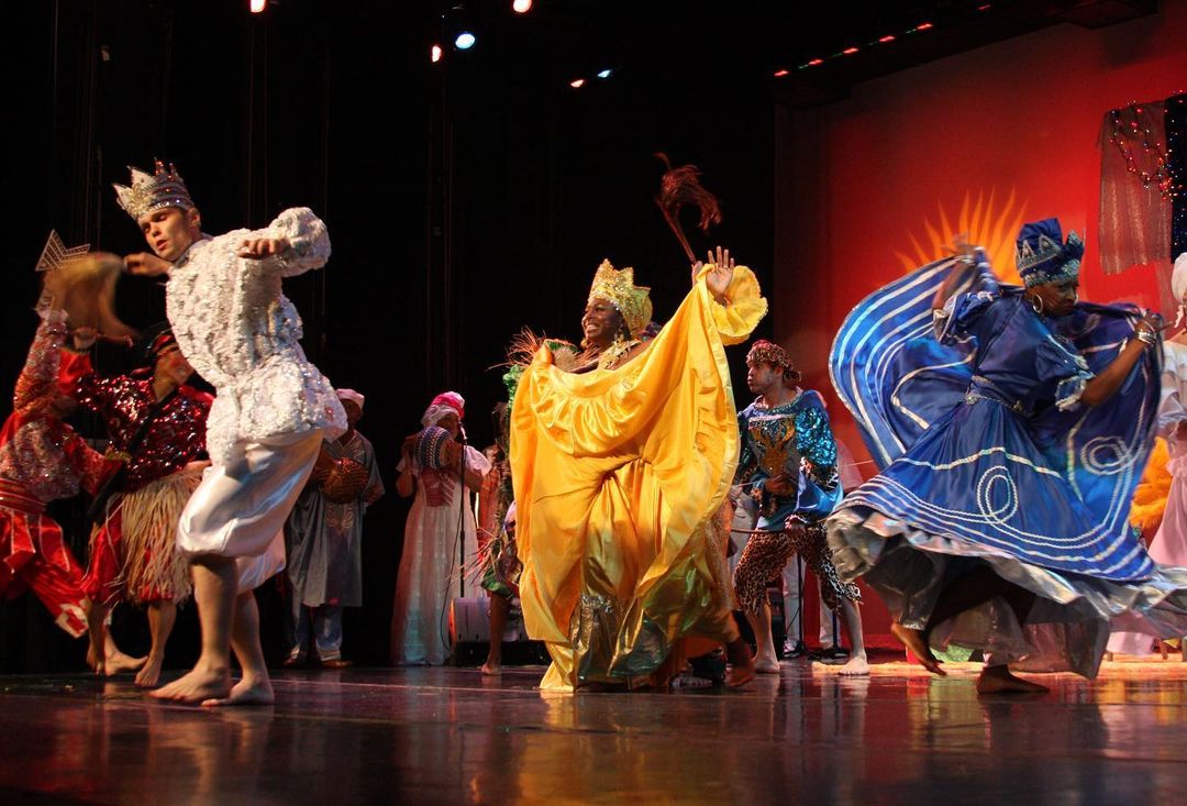 Performers dancing at Queens Theatre. Photo by instagram user @queenstheatre