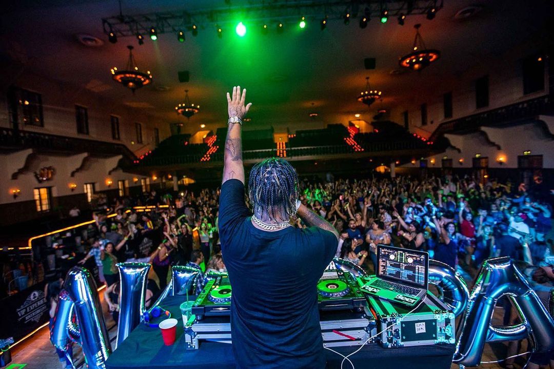 DJ playing music for a crowd. Photo by Instagram user @riversidelive.