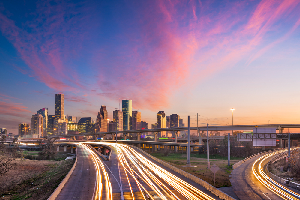 Downtown Houston, Texas, at Dusk with Traffic Running on the Highway