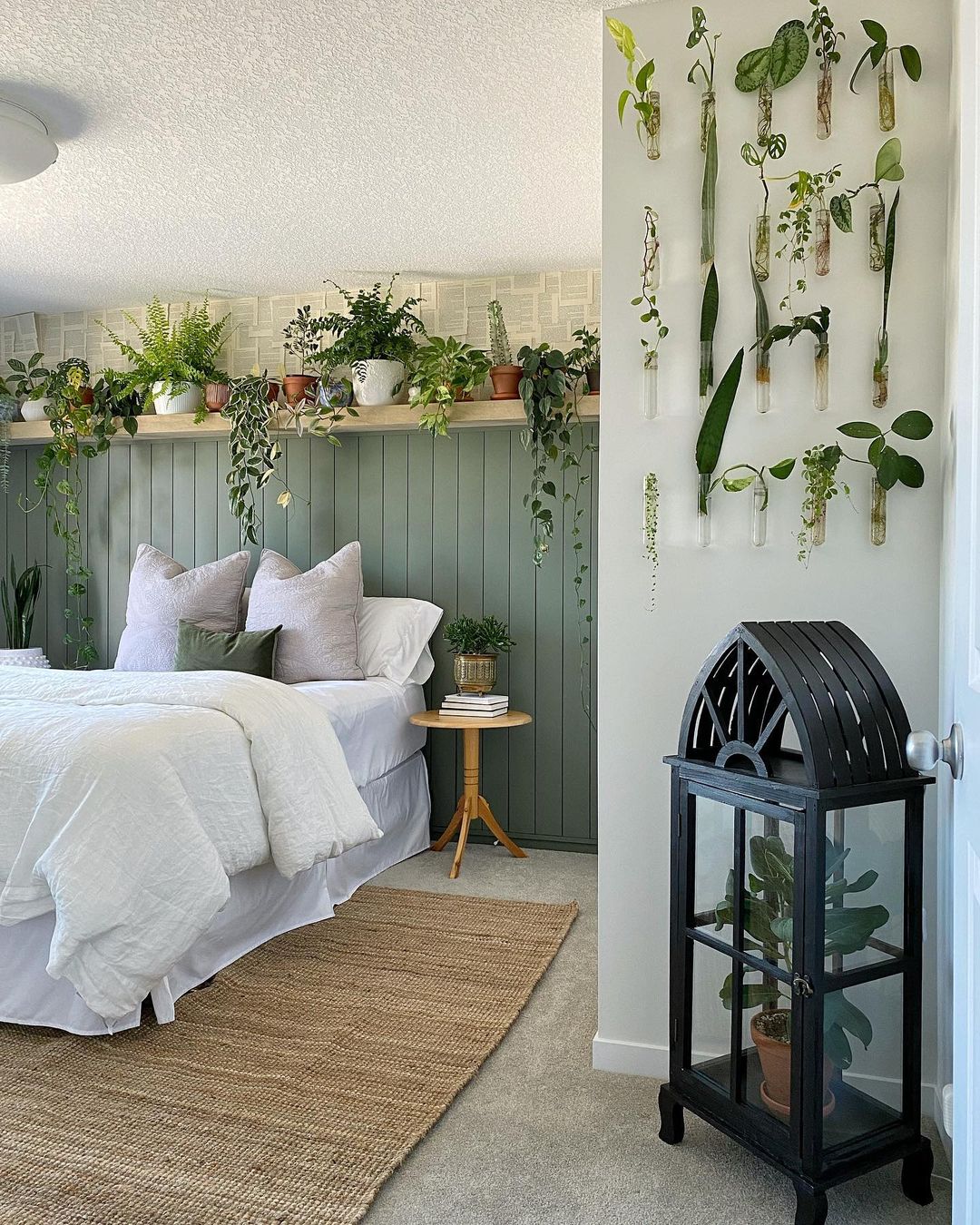 Bedroom Designed with Green Accents and Small Plants. Photo by Instagram user @thisisdrover