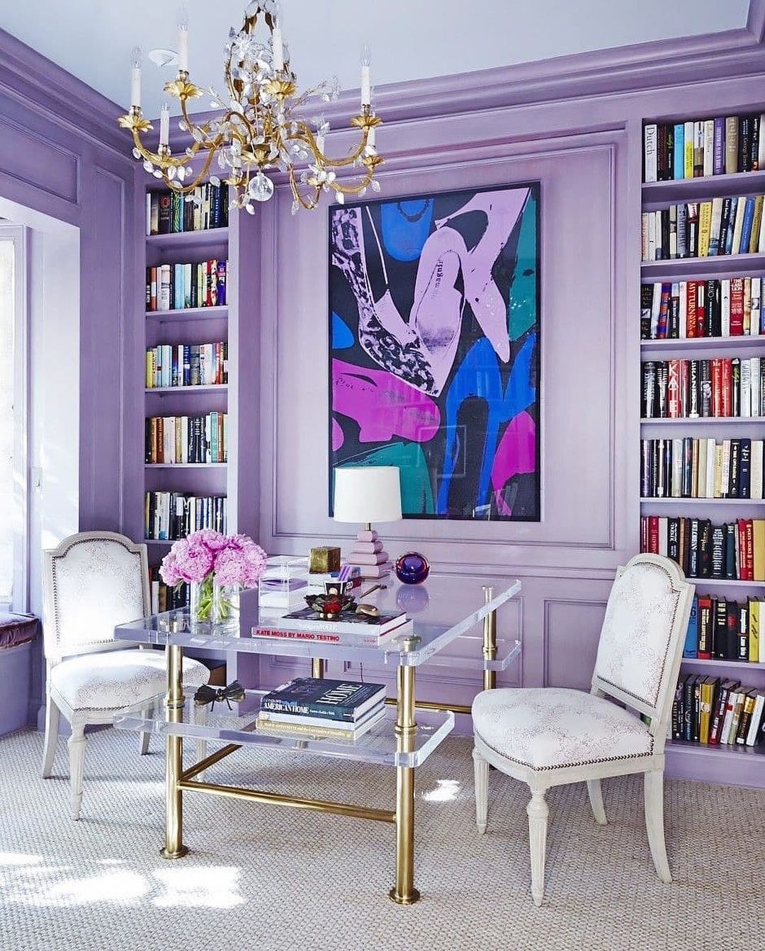 Purple Sitting Room with Books on Shelves in Southeast Feng Shui Direction. Photo by Instagram user @roomhomestyling