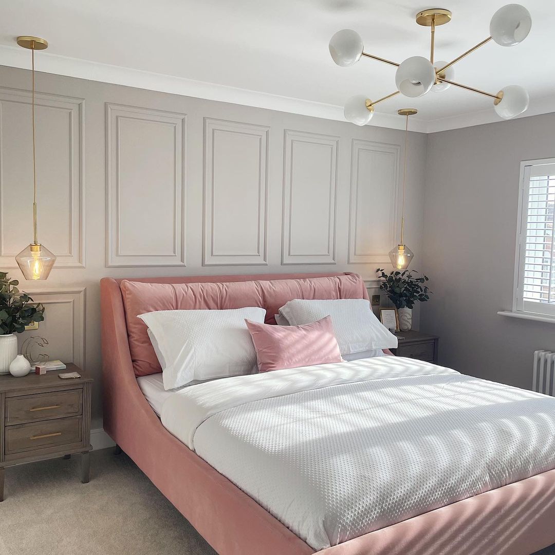Bedroom with Pink Bed and White Sheets. Photo by Instragram user @overatthemillers