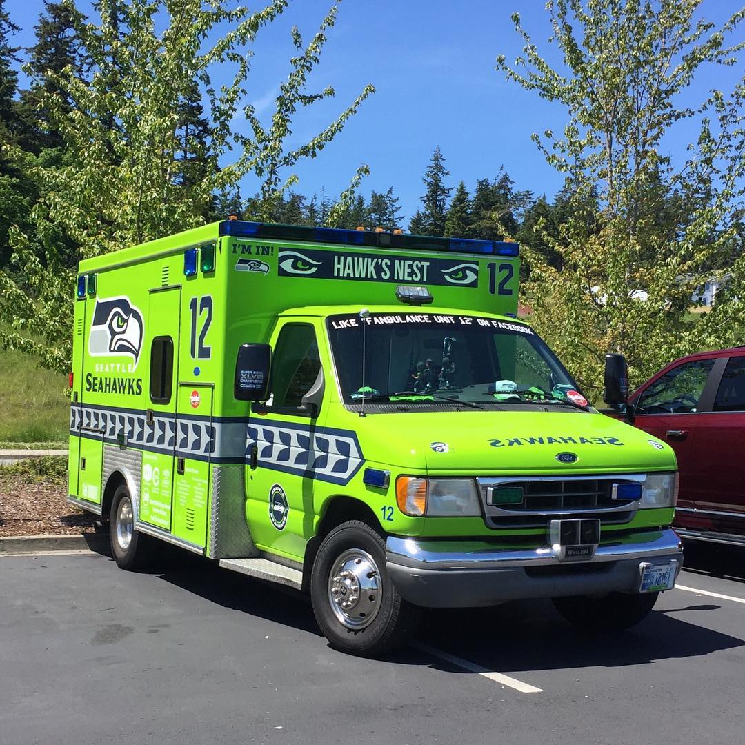 Neon green ambulance also known as a fanbulance parked in a lot for a tailgating party. Photo by instagram user @lifecurrents