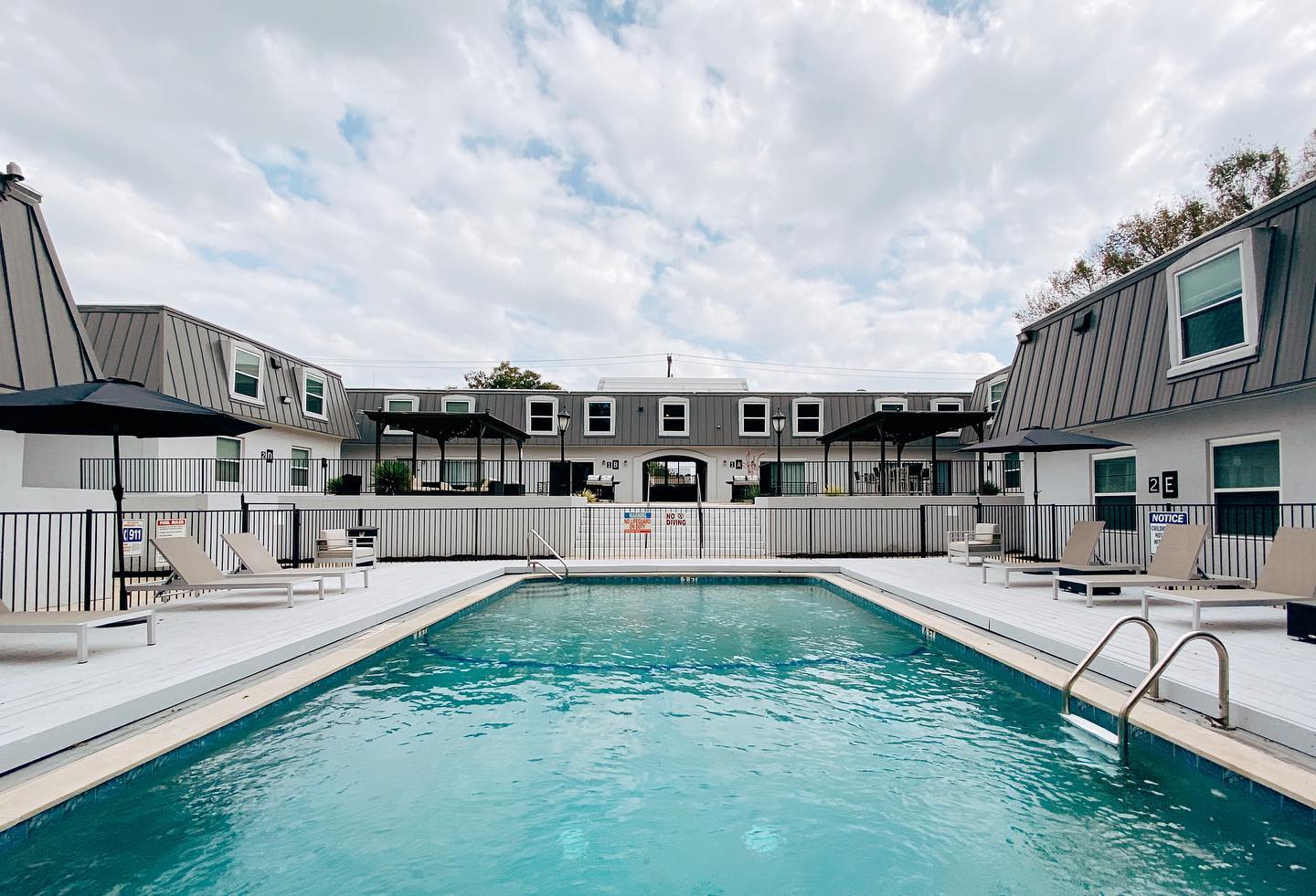 Apartment building with swimming pool in Mueller neighborhood in Austin, TX. Photo by Instagram user @mueller_crossing