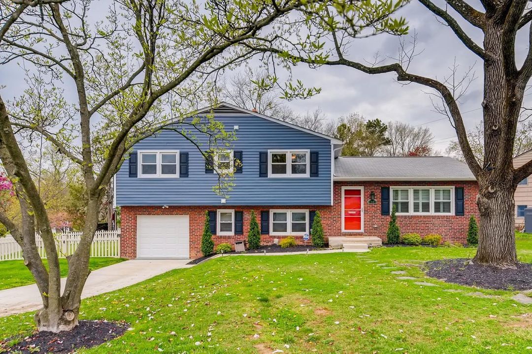 Split Level Home with a Red Door in Lutherville-Timonium, MD. Photo by Instagram user @hghomegroup
