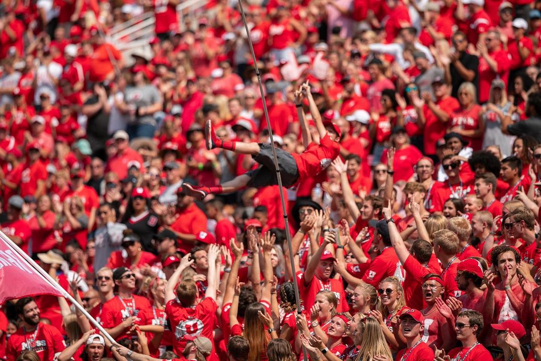 Utah Utes Fans Tossing Fans In the Stands. Photo by Instagram user @utahfootball