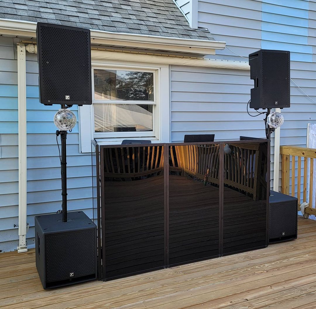 DJ Booth Set Up on a Deck. Photo by Instagram user @paparazzient