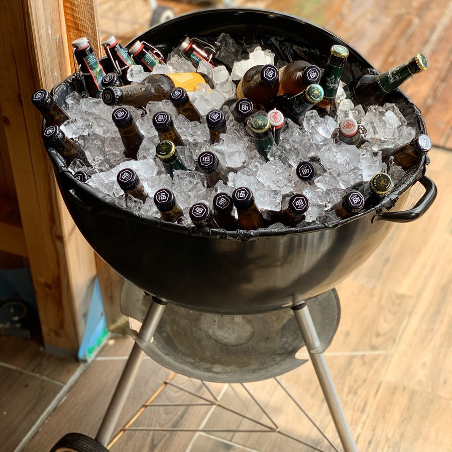 Charcoal Grill Reused as a Cooler for Beer. Photo by Instagram user @swissgrillblog