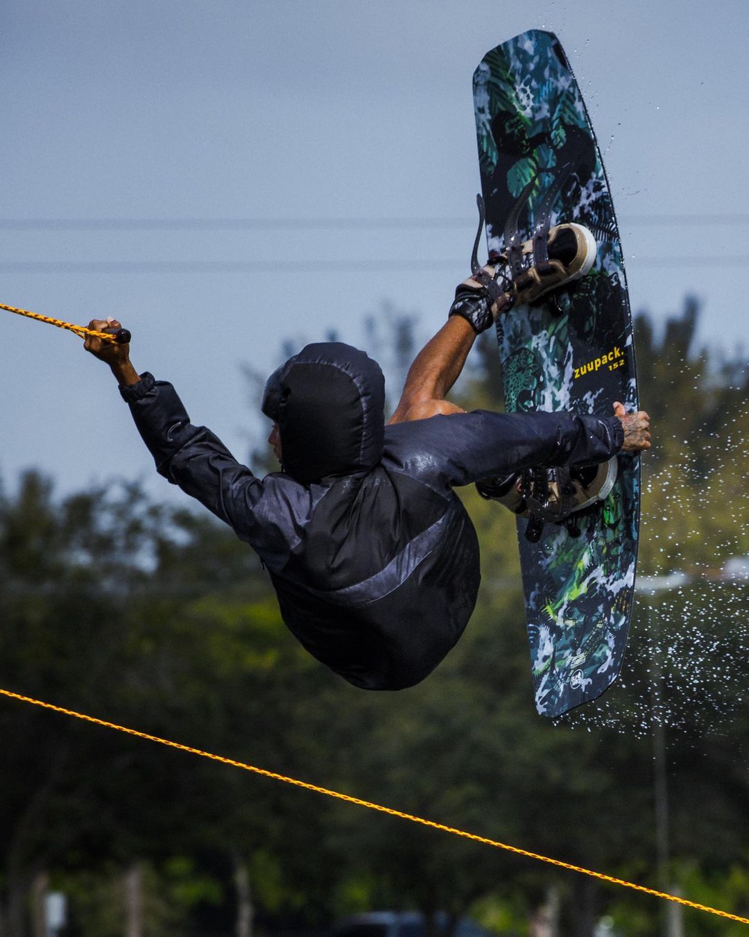 Person Doing Tricks on a Wakeboard. Photo by Instagram user @zuupack