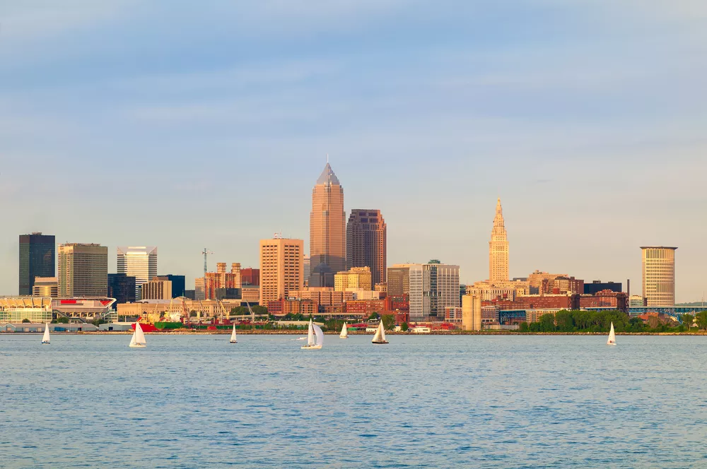 A view of the Cleveland skyline at sunset looking over Lake Erie in Ohio