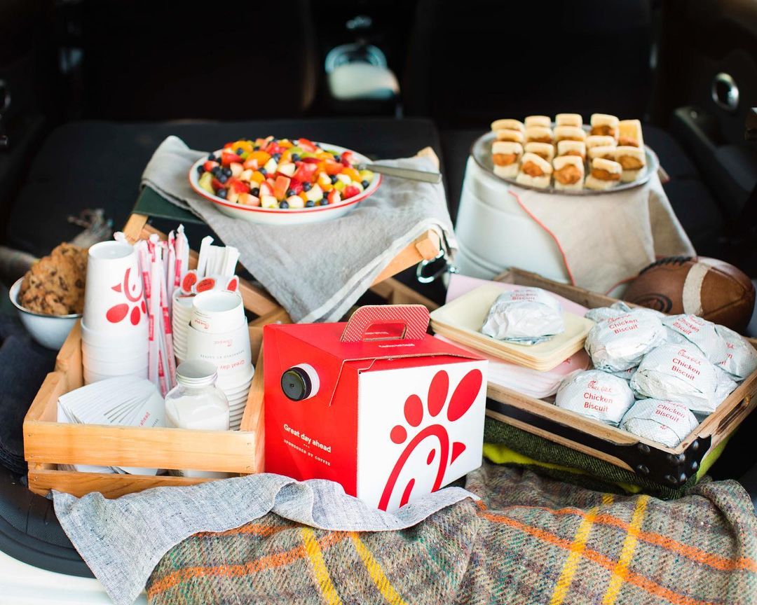 Chick Fil A Catered Food in a Car. Photo by Instagram user @cfacorinth