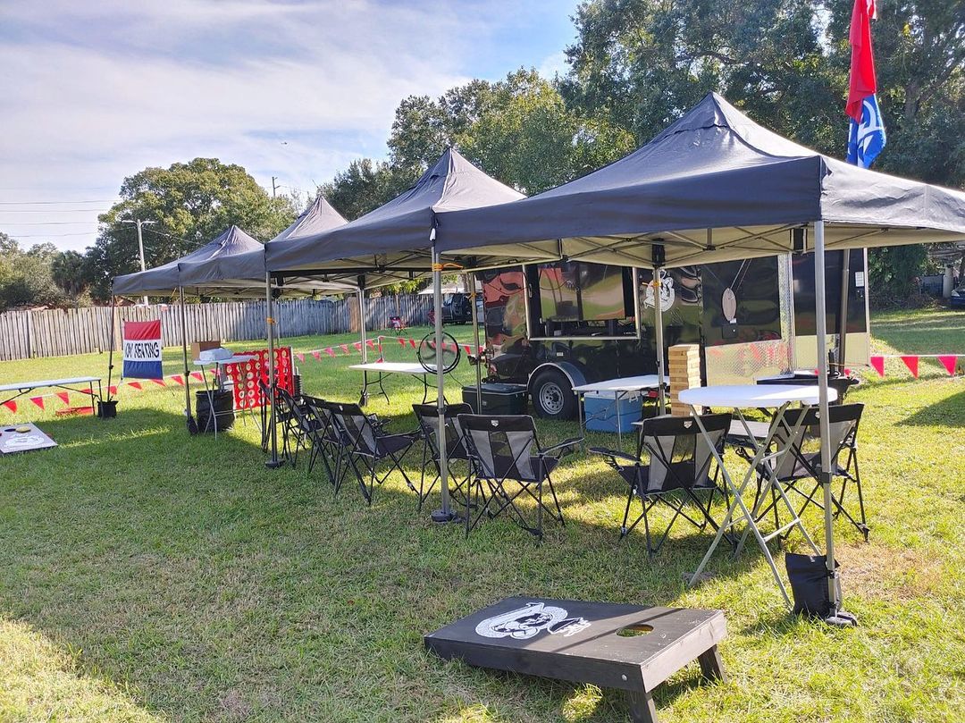 Canopies Set Up at a Backyard Tailgate. Photo by Instagram user @tailgateproentertainment