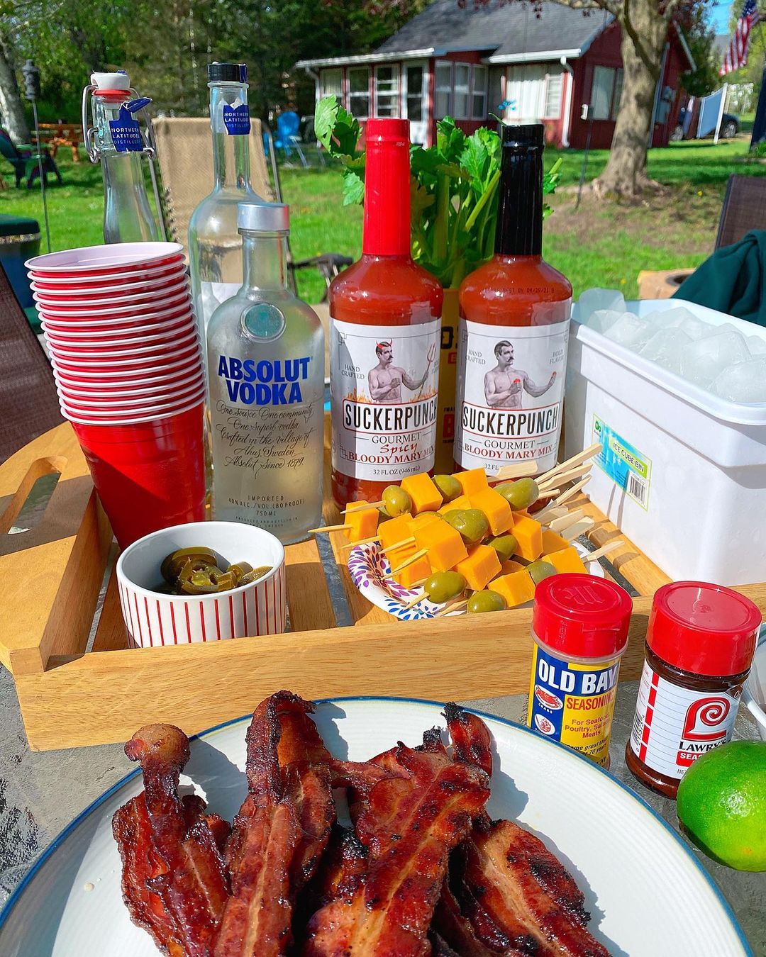 Bloody Mary Bar Set Up on a Table. Photo by Instagram user @chifoodiebecs