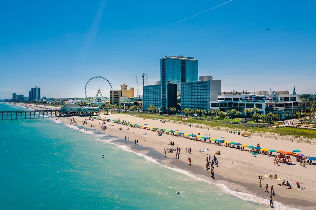 People on the Sand at Myrtle Beach in Myrtle Beach, SC. Photo by Instagram user @mymyrtlebeach