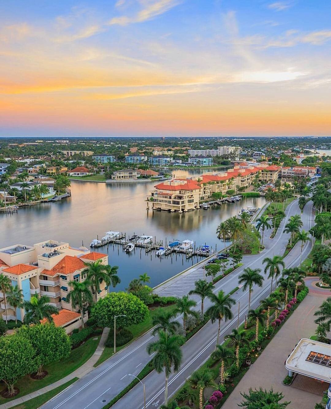 Aerial Photo of Condos at Dusk in Naples, FL. Photo by Instagram user @naplesswfl