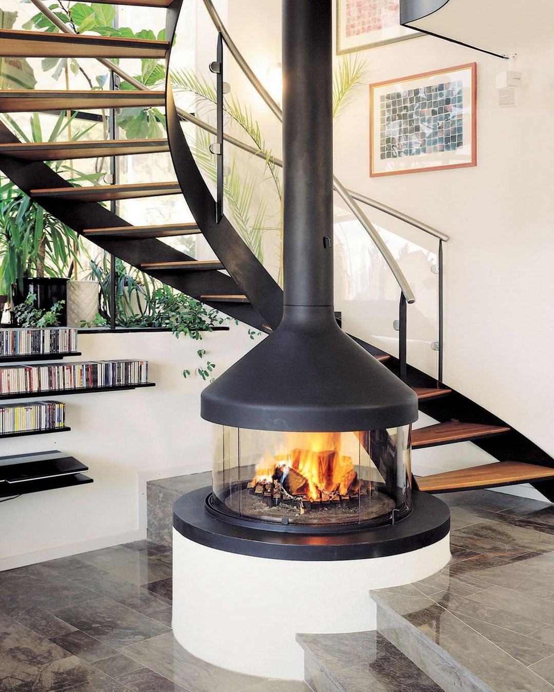 Modern Home with Spiral Staircase and Fireplace. Photo by Instagram user @heartlyhome