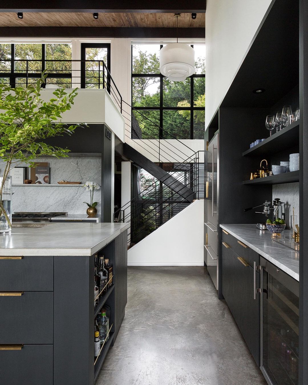 Modern Kitchen with Lots of Dark Accents and Metallic. Photo by Instagram user @kaylen.flugel.design