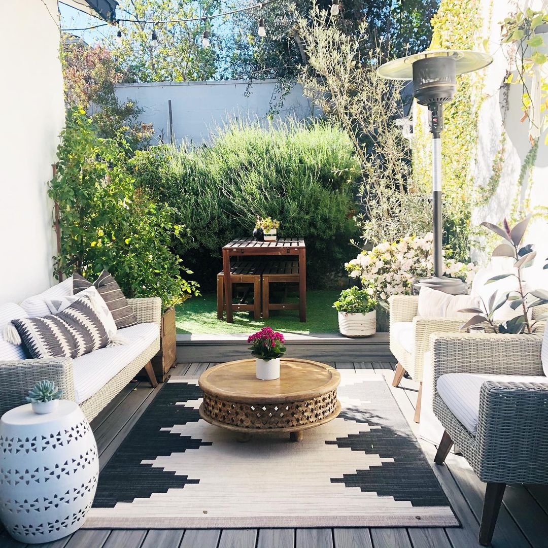 Outdoor Seating Area with Small Coffee Table. Photo by Instagram user @designs.by.filia