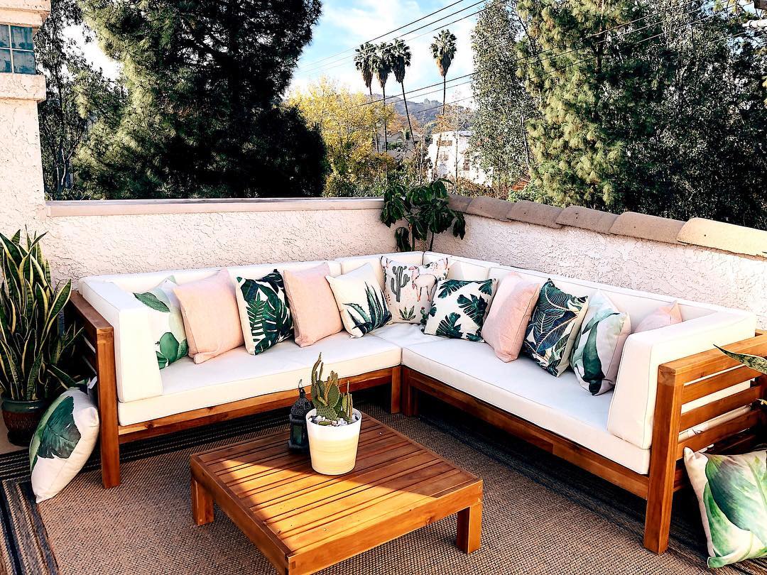 Outdoor Sectional Couch on a Small Balcony. Photo by Instagram user @simplysanfordco