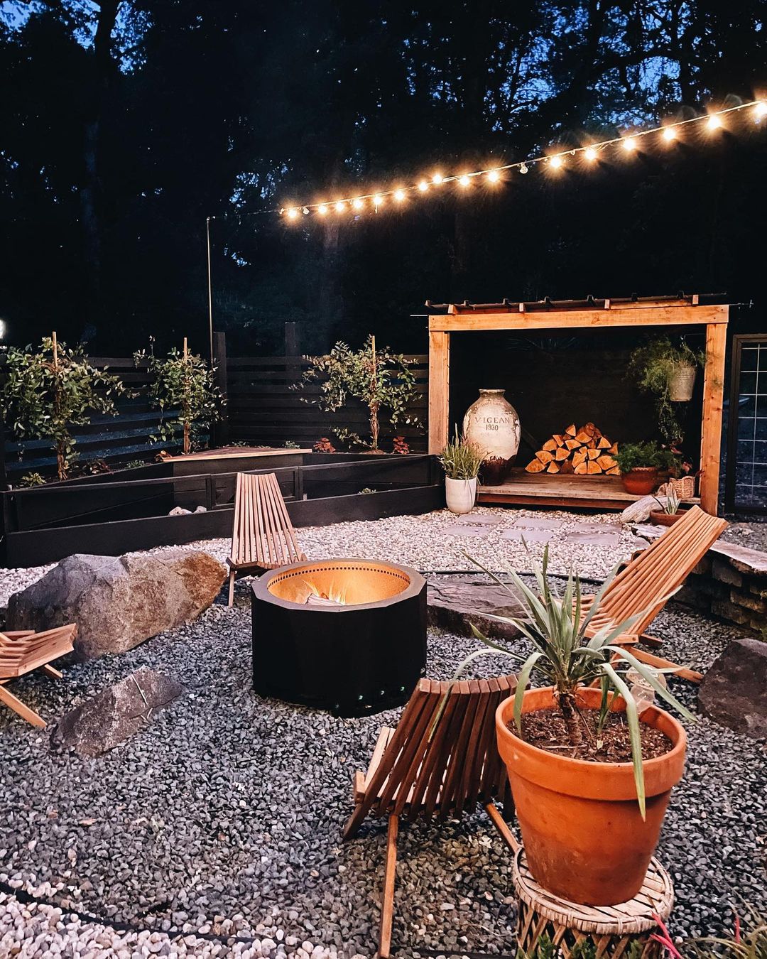 Backyard Seating Area with Fire Pit. Photo by Instagram user @lazyhaven