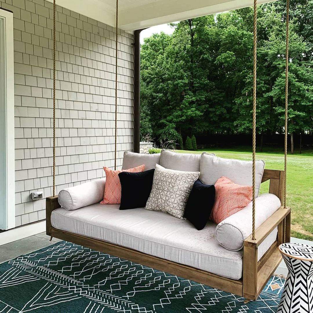 Hanging Outdoor Swing on a Porch. Photo by Instagram user @stouijer