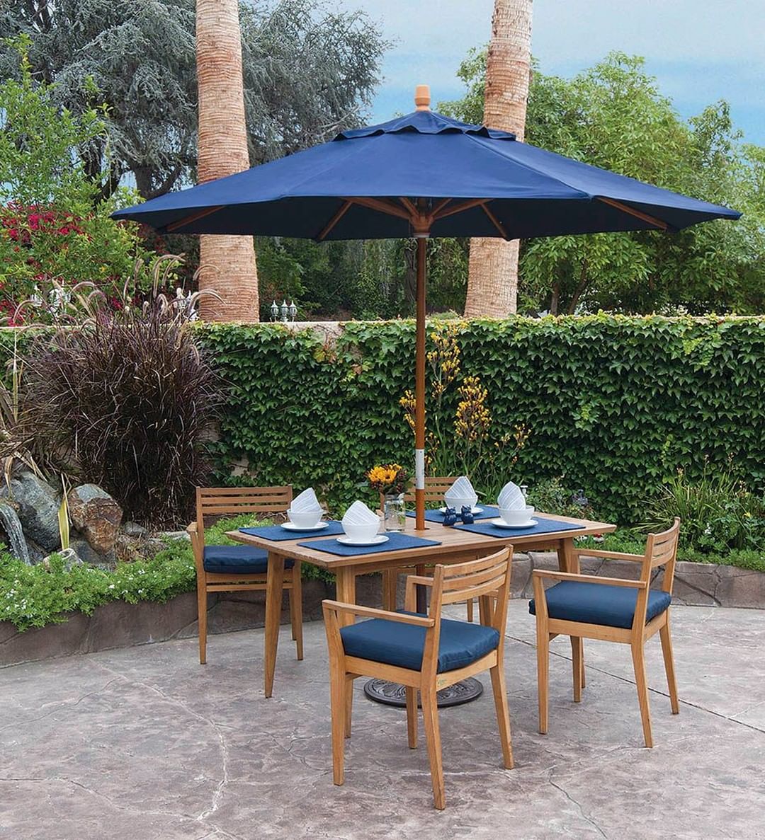 Outdoor Dining Set with Umbrella. Photo by Instagram user @islandtrading