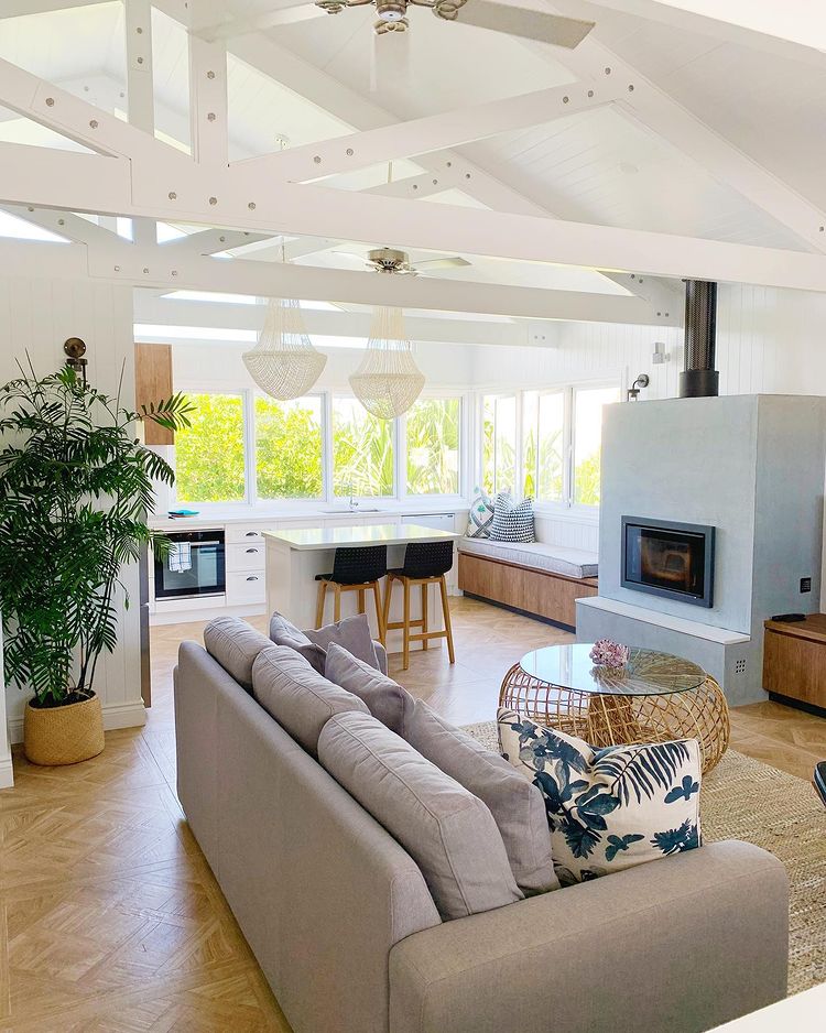 Modern Farmhouse open floor plan with exposed beams on the ceiling. Photo by instagram user @howzit_mgt