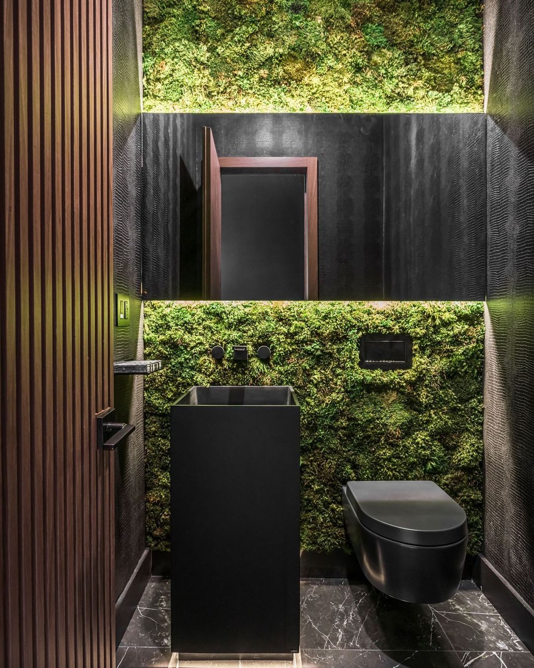 Living Greenery Wall in a Powder Room. Photo by Instagram user @2id_interiors