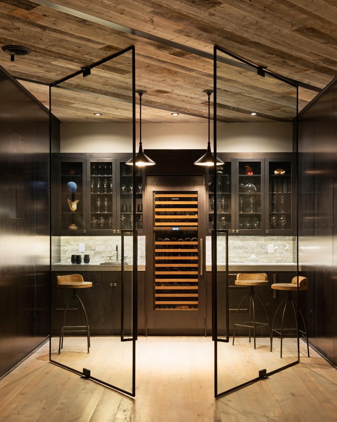 Basement Wine Bar with Spinning Glass Doors. Photo by Instagram user @wkphotography