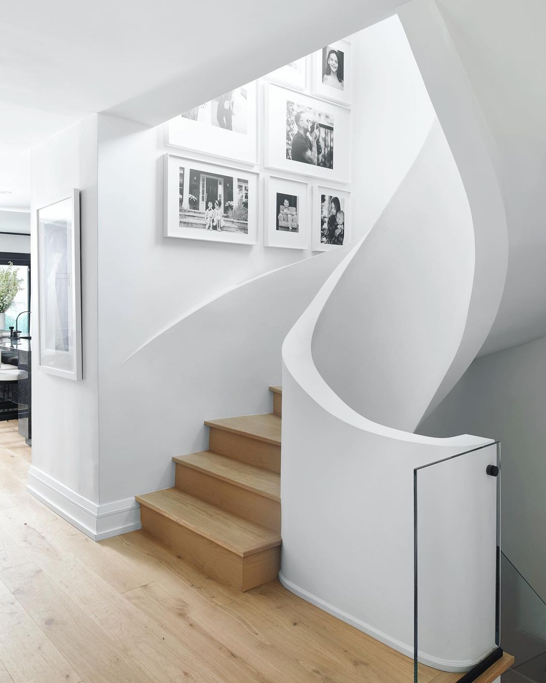 Sculpted Staircase in a Modern Home. Photo by Instagram user @alibuddinteriors