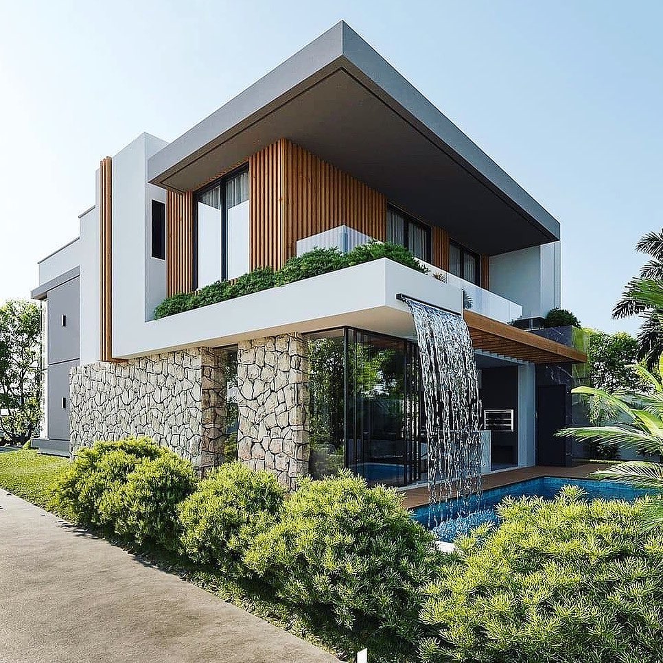 Modern Home with a Large Waterfall Into the Pool. Photo by Instagram user @sbs.ghana