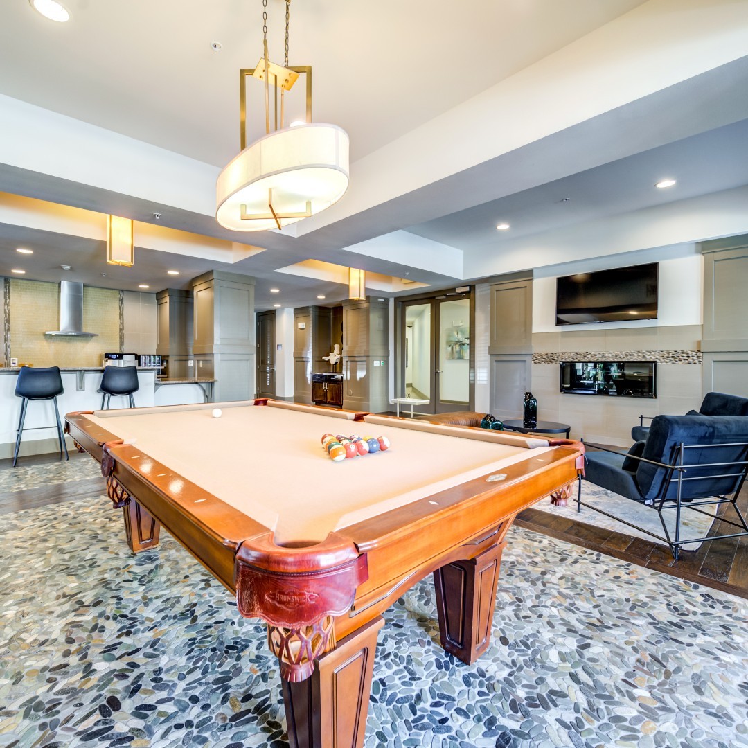 Apartment Clubhouse Area with a Pool Table. Photo by Instagram user @creekstoneatrtp