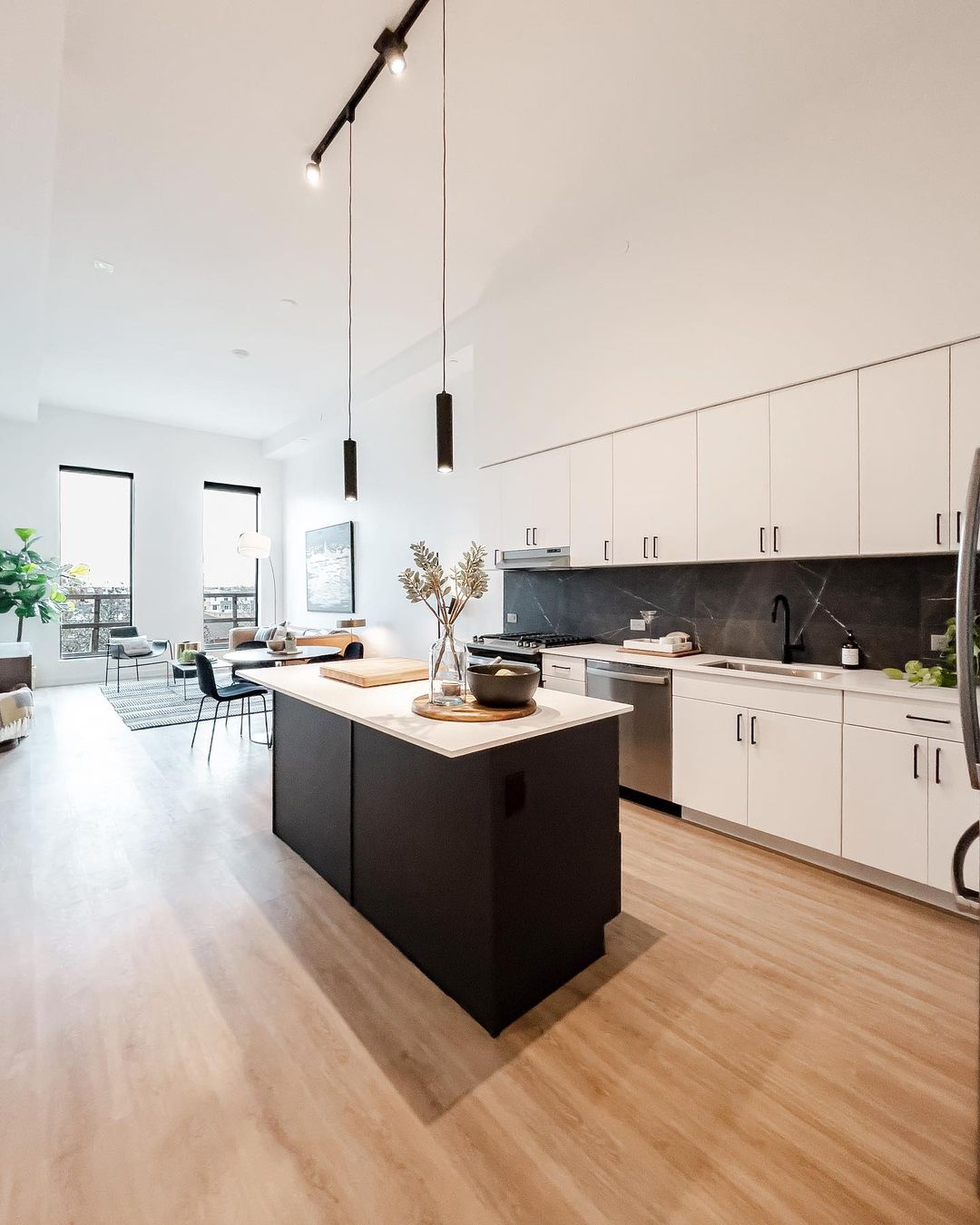 Updated Hardwood Open Concept Apartment Kitchen & Dining Space. Photo by Instagram user @tom_coselli