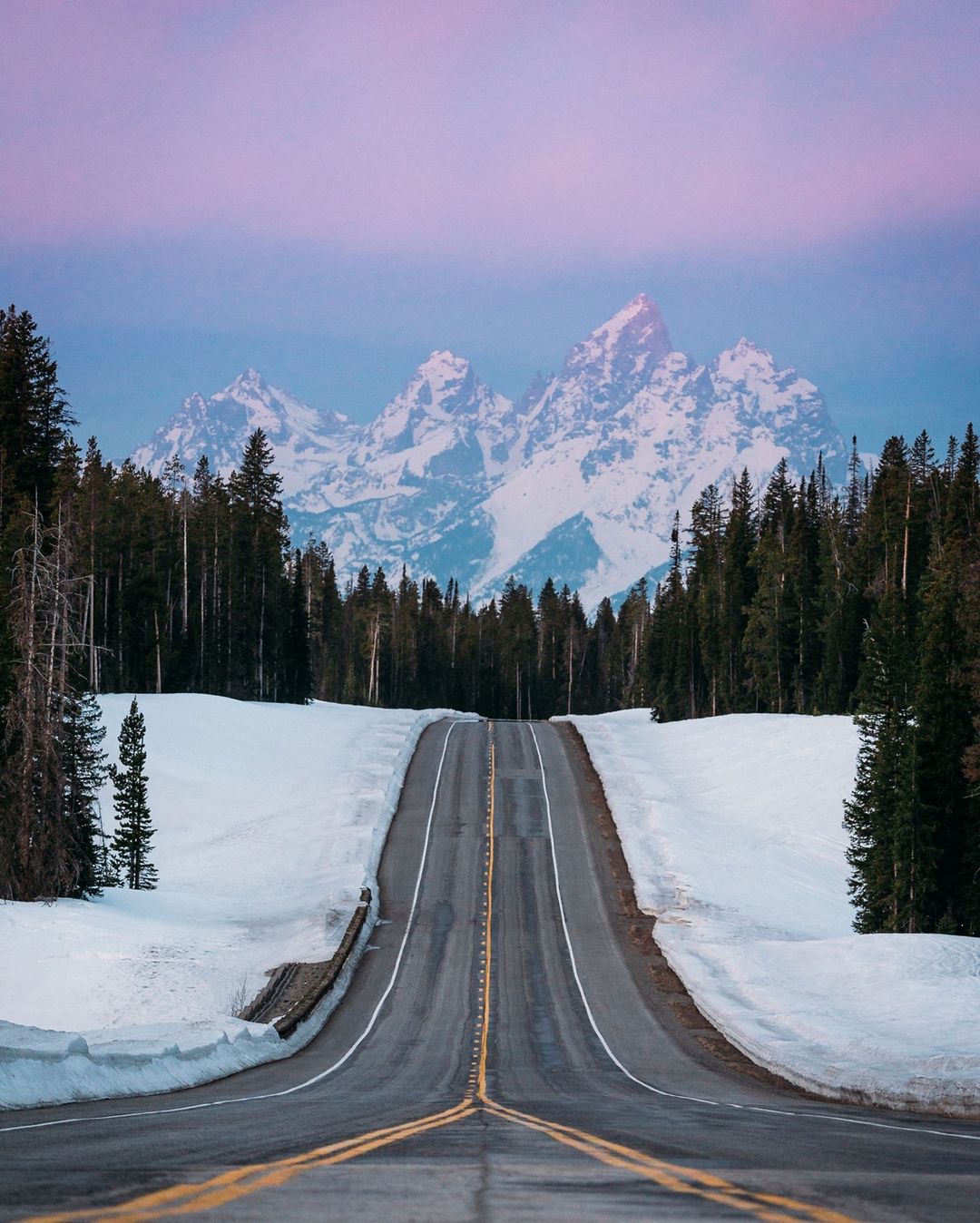 View Looking Down a Main Road toward the Mountains in Jackson Hole, WY. Photo by Instagram user @androsbeachclubtravel