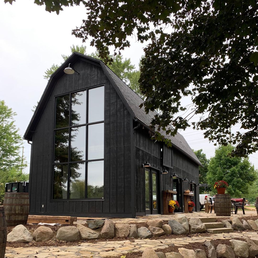 Large Black, Rustic Style Barndominium. Photo by Instagram user @bluezonespaces