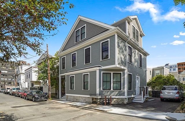 Exterior gray colored multi level home