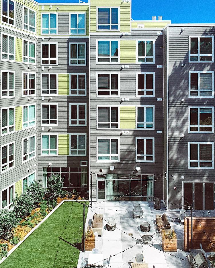 Modern apartment building complex exterior shot of courtyard