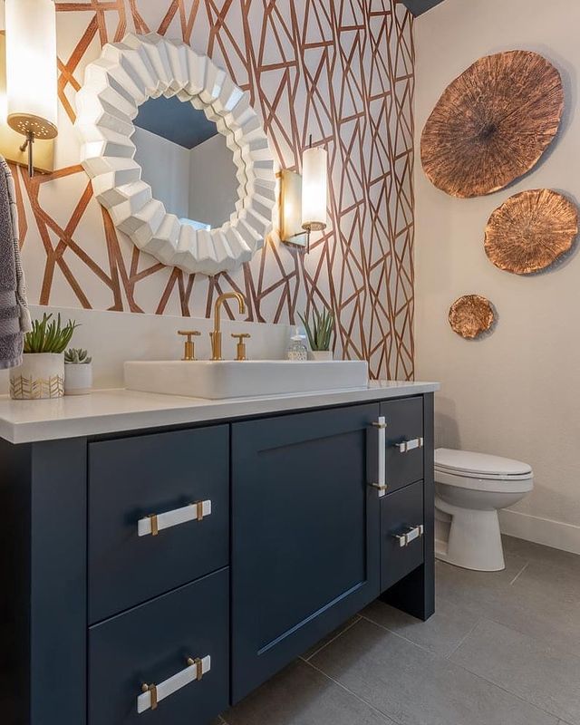 Bathroom with Accent Wall Using Geometric Shapes. Photo by Instagram user @meredith_parrish_design
