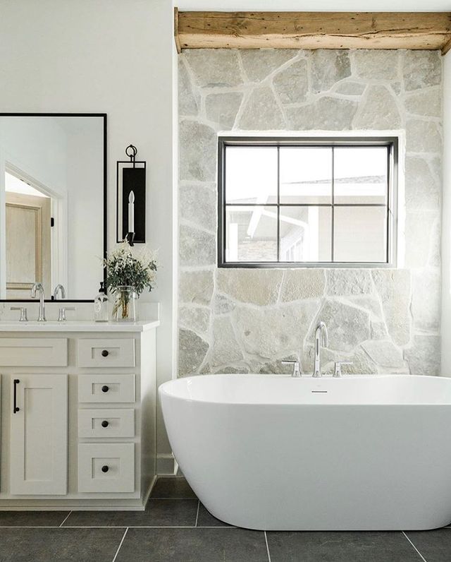 Stone Accent Wall in a Bathroom. Photo by Instagram user @pella_dallas