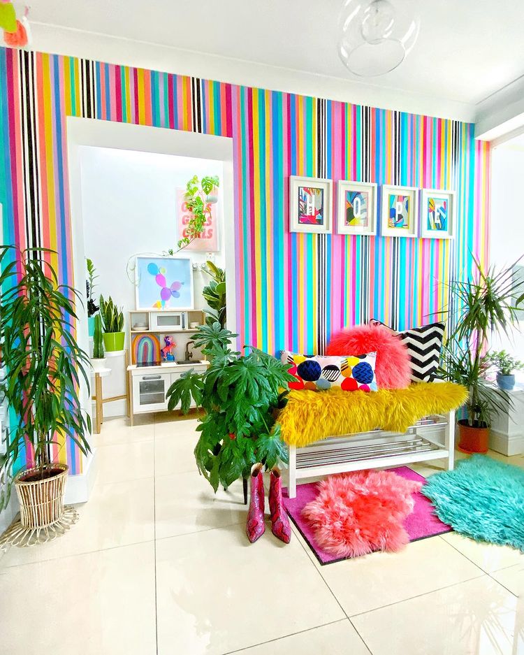 Bright Stripes Painted on an Accent Wall. Photo by Instagram user @rowans_rainbow