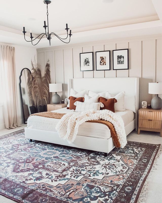 Bright Bedroom with Board & Batten Installed behind the Bed. Photo by Instagram user @whitefarmhousehaven