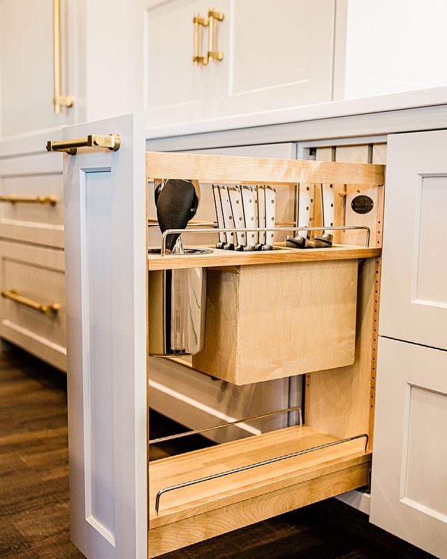 Interior view of build-in storage in kitchen cabinets.