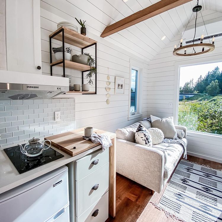 Interior view of hybrid kitchen and living room space.