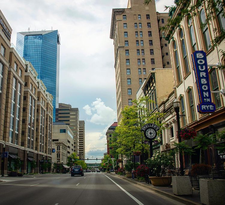 Street view of downtown Lexington with a bourbon sign. Photo by instagram user @theamericanskyline