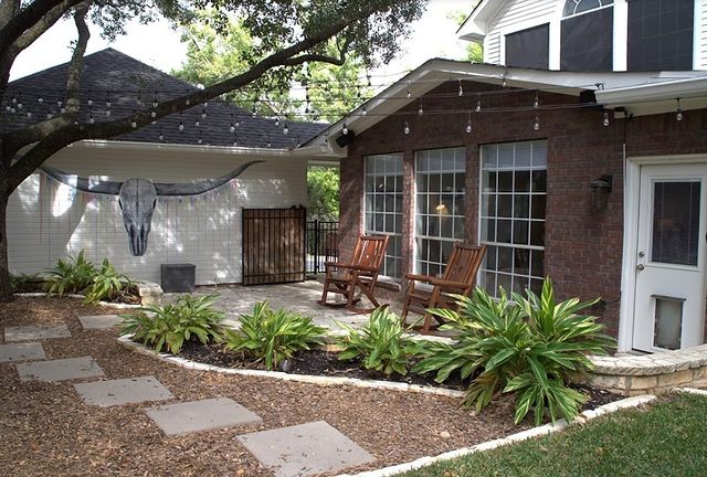 Exterior patio view of a garden pathway