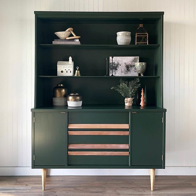 Green cabinet that has been upcycled. Photo by Instagram user @paintingbythepenny