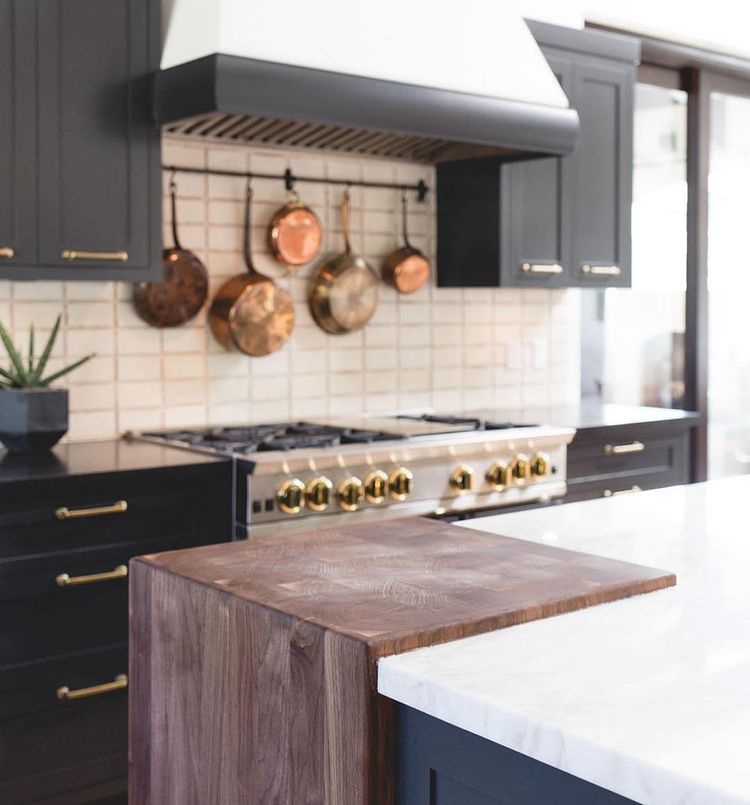 Kitchen countertop with built-in cutting board. Photo by Instagram user @gontermanconstruction.