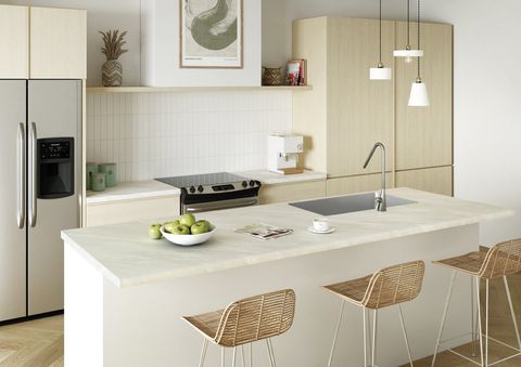 Kitchen interior with white laminate countertops. Photo by Instagram user @arboritehpl.